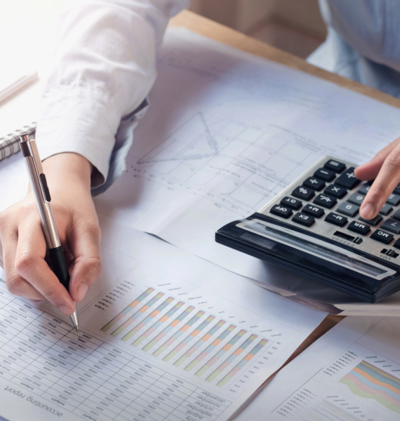 finance-accounting-concept-business-woman-working-desk-using-calculator-1